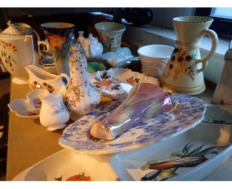 Shelf of mixed ceramics