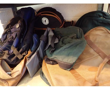 Shelf of protective camera bags holdalls and sports bags 