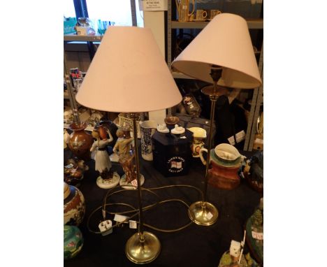 Pair of 70cm tall table lamps with slim cylindrical brass columns  CONDITION REPORT: The electrical items included in this lo