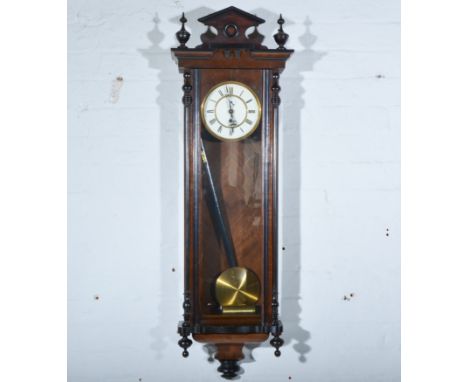 Ebonised walnut and beechwood regulator type wall clock, white enamelled dial, subsidiary second dial, single weight driven, 