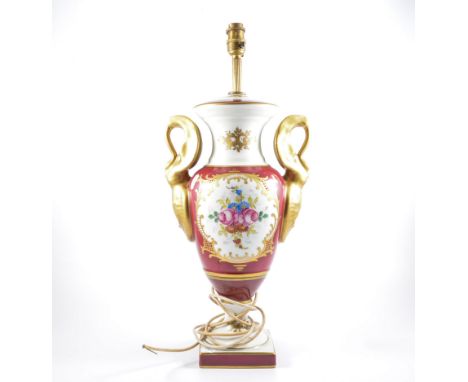 Reproduction Harris style porcelain lamp base, gilt twin handled designed as swans, floral pannels enclosed by gilt boarders 