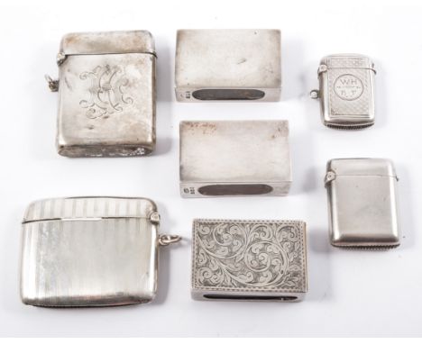 Four silver vesta cases, plain and engine turned designs, sizes from 3.3mm x 2.2mm to 5.5mm x 4mm, three silver matchbox hold