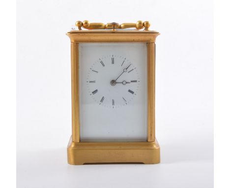 French brass cased carriage clock, rectangular enamelled dial with Roman numerals, repeating movement, striking on a bell, he