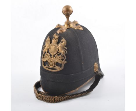 British Royal Artillery Home Service 1878 pattern cloth helmet, gilt metal ball tip and Terrritorial Royal Arms plate, in a t
