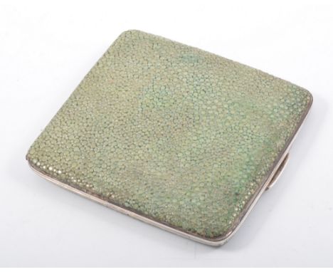 A silver and shagreen cigarette case, engine turned interior, 9cm x 8cm, hallmarked Birmingham 1934, George V Jubilee mark, m