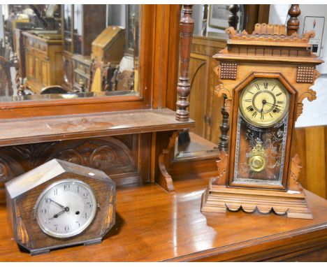 An Ansonia shelf clock with roman numeral chapter ring and twin train movement, glass door to front revealing pendulum, overa