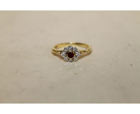 A HALLMARKED 18 CT GOLD RUBY AND DIAMOND RING, APPROX WEIGHT 2.9 G