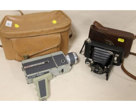 A EUMIG EUMIGETTE ZOOM SUPER 8 MOVIE CAMERA IN CASE, SOME DAMAGE INCLUDING SCUFFS TO PAINT WORK PLUS A VINTAGE KODAK NO. A120