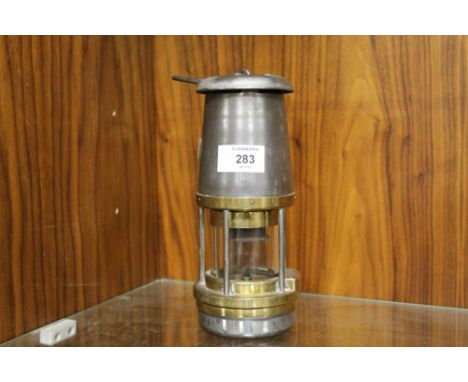 A VINTAGE 'WOLF SAFETY' MINERS LAMP