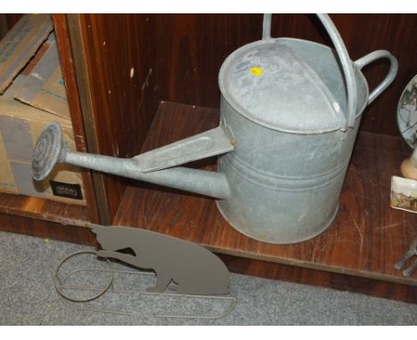 A VINTAGE GALVANISED WATERING CAN TOGETHER WITH A CAT DESIGN PLANT POT HOLDER (2)