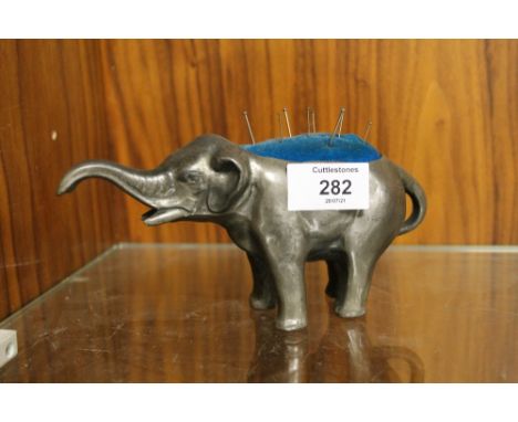 A VINTAGE ELEPHANT PIN CUSHION