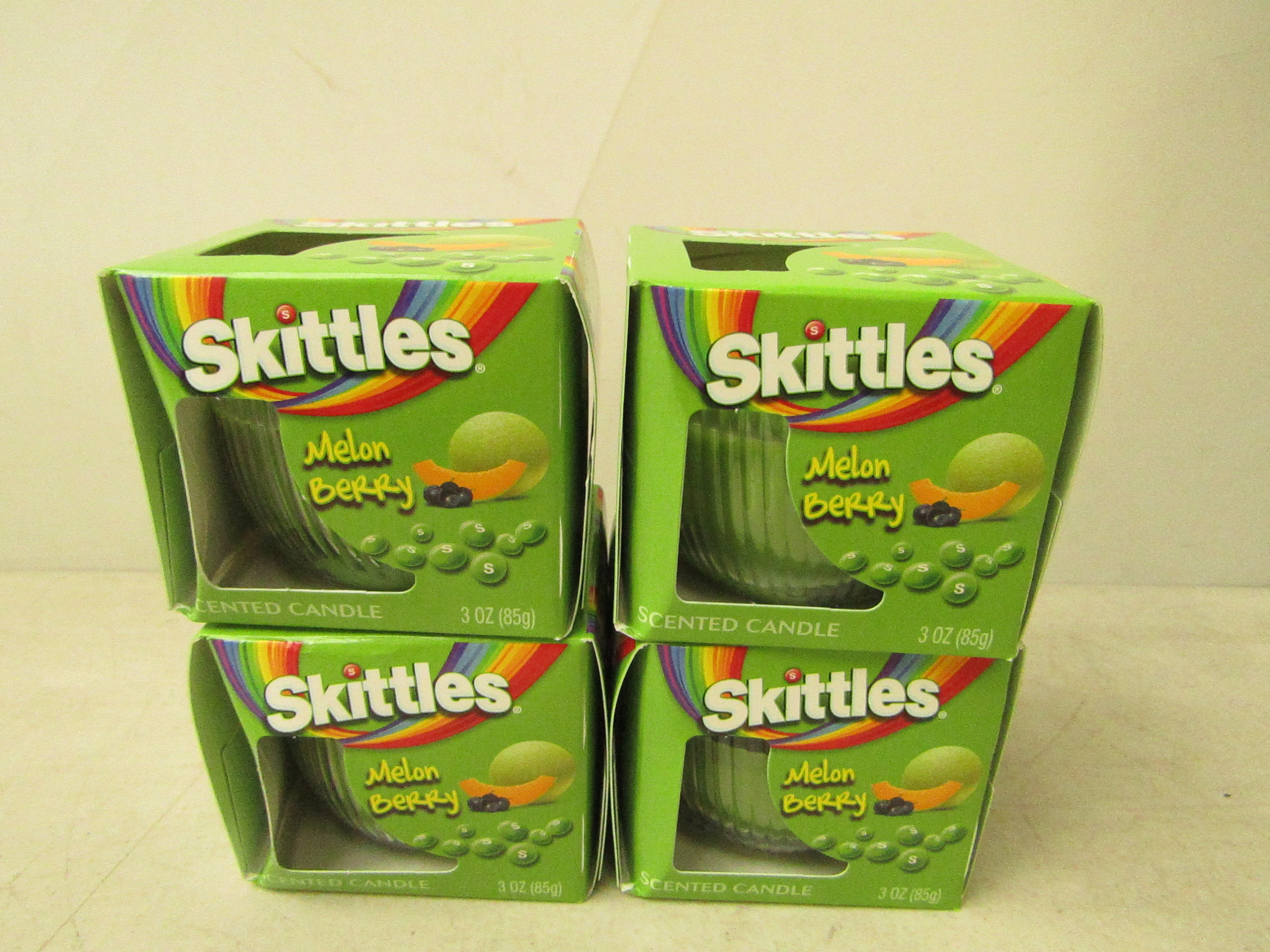 4x Skittles melon berry scented candles, all new and packaged.