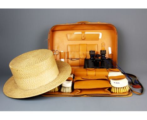 A vintage Tress &amp; Co. straw boater with a gentleman's pig skin travelling case and other items.