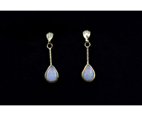 A pair of 9ct yellow gold marquise cut opal set drop earrings, L. 2.2cm.