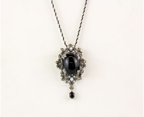 A sterling silver marcasite and pearl pendant and chain.