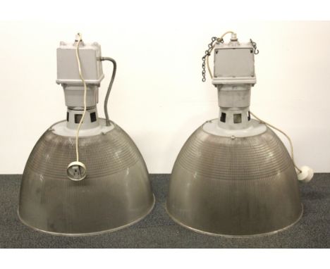 A pair of vintage industrial ceiling lights from the Laker Airlines hanger at Southend airport, Dia. 50cm, H.