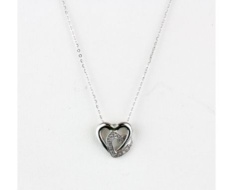 A 9ct white gold diamond set heart shaped pendant and chain.
