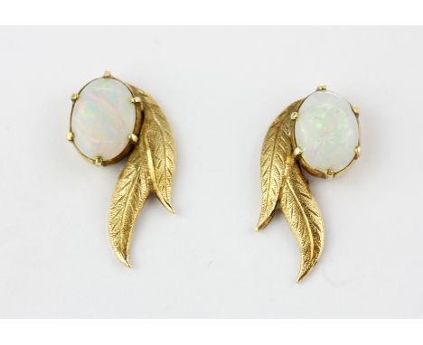 A pair of yellow metal (tested 9ct gold) opal set earrings, L. 2.1cm.