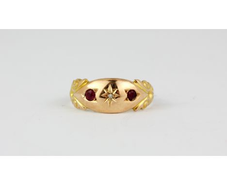 A 9ct rose gold ruby and diamond set ring, (J).