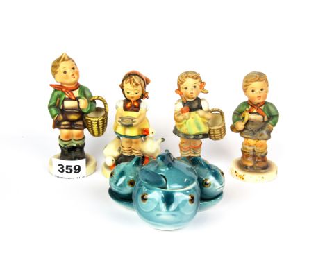 A group of four Hummel figures of children, tallest 13cm. Together with a Hummel fish cruet.
