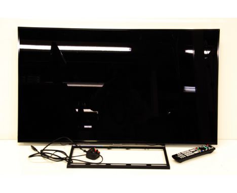 A Panasonic 44" smart Viera LED TV with wall mount bracket and remote control.