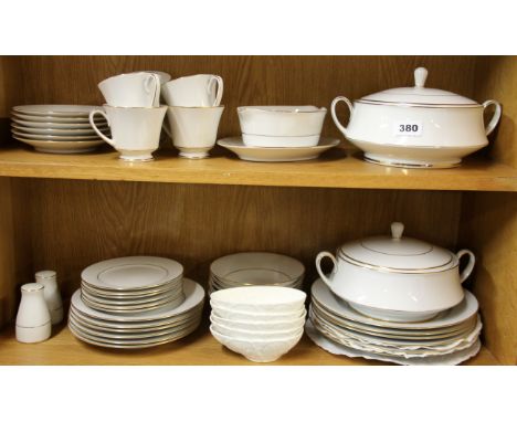 An extensive gilt trimmed Noritaki white porcelain tea and dinner set, together with five Coalport avocado dishes.