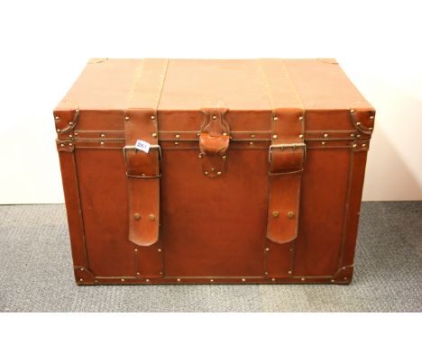 An impressive large leather trunk, 76 x 46 x 51cm.