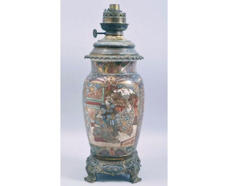 A JAPANESE SATSUMA PORCELAIN LAMP VASE with metal mounts, decorated with panels of figures, supported on a fitted metal base 