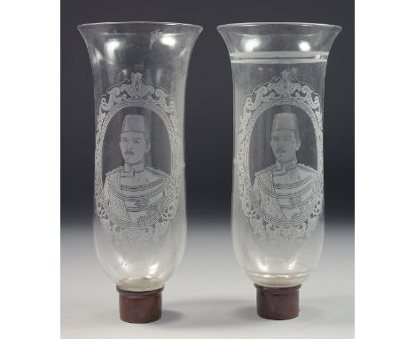 TWO OTTOMAN EGYPTIAN GLASS LAMP SHADES, both depicting a portrait of Abbas Hilmi Pasha, 27.5cm high, (2).