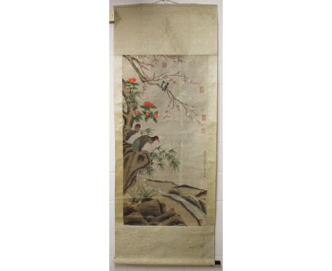 A GOOD LARGE CHINESE SCROLL PAINTING, depicting birds and native flora above a stream, with seven red seal stamps and inscrip