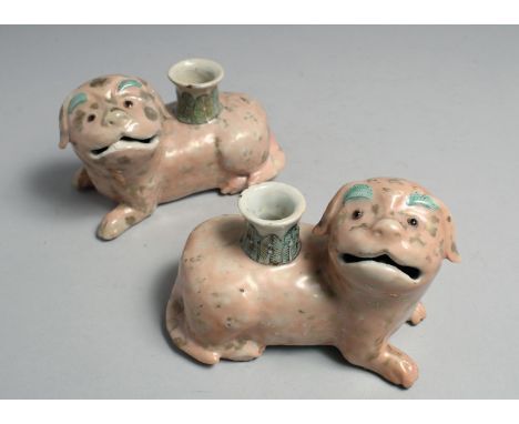 A PAIR OF 19TH CENTURY CHINESE CANTON PORCELAIN FOO DOG CANDLESTICK HOLDERS, each 13cm long