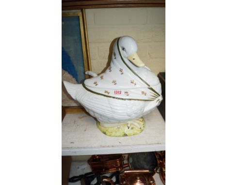 A Continental pottery goose tureen, cover and ladle, 35.5cm high. 