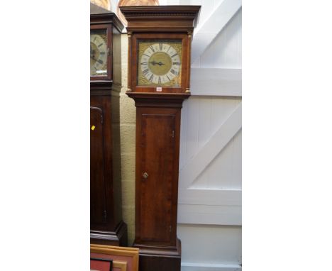 An 18th century 30 hour longcase clock dial and movement, the 11 inch square brass dial inscribed 'Daniell Tribe, Petersfield