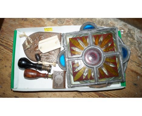 A mixed lot, to include: two stained and leaded glass panels; two seals; a novelty miniature barrel compass; and an Edward VI