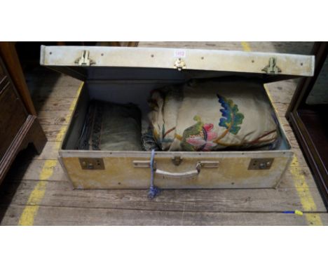 A small quantity of Chinese embroidered silk panels; together with an antique crewel work curtain; curtain tie-backs etc, con