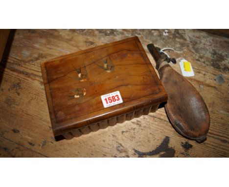 An old olivewood box; together with a leather powder flask.