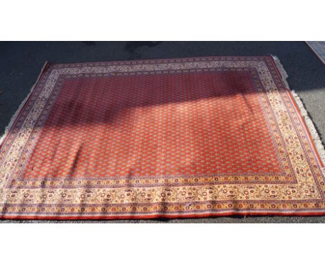 An Israeli Wilton style carpet, having repeated pattern, 350 x 250cm.