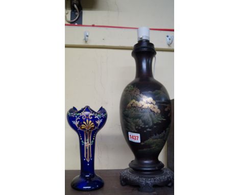 A Japanese lacquered table lamp; together with another blue glass vase. 