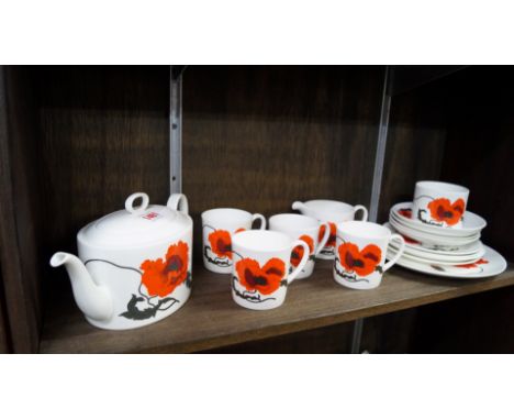 A Wedgwood Susie Cooper 'Corn Poppy' pattern tea service for four, (star crack to cover of teapot). 