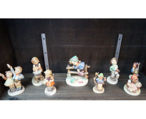 Eight Hummel figures, to include: 'Apple Tree Girl' and 'School Girl'. Condition Report: All figures appear free from chips, 