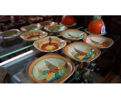 Five Clarice Cliff for A J Wilkinson Ltd Bizarre dishes, 12cm wide; together with a Carltonware orange preserve pot, cover an