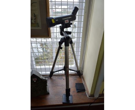 An Opticron Mighty Midget 8-50 x 60mm telescope, on tripod stand. 
