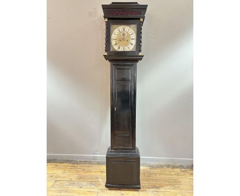 A George III ebonised longcase clock, the 11" brass dial with silvered chapter ring, date aperture and subsidiary dial, the h