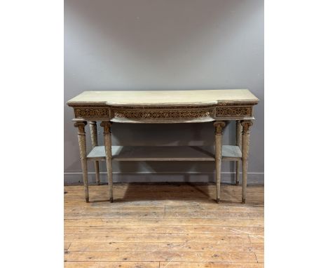 A painted and parcel gilt large breakfront console table, in early 19th century style, the rectangular top with bowed central