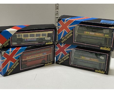 Four boxed Solido die-cast models 