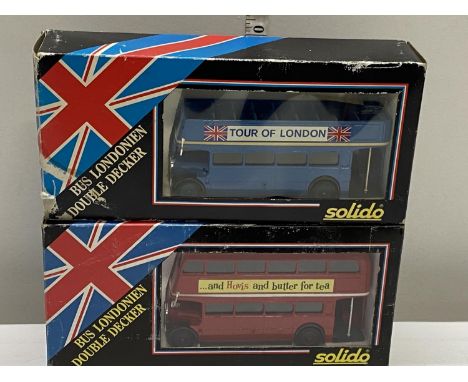Two boxed Solido bus models 