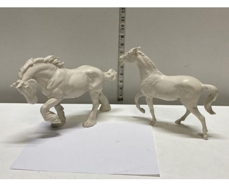 Two Royal Doulton white ceramic horses 