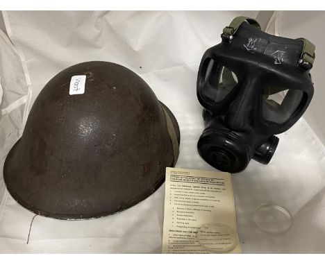 A 1970's British Military helmet and respirator 