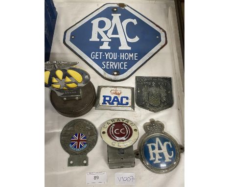 A vintage RAC enamel sign and collection of assorted car bumper badges 