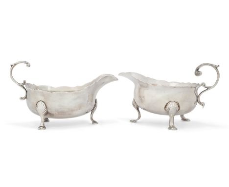 A provincial George III silver sauce boat. John Langlands I & John Robertson I, Newcastle, 1783. With scalloped rim and flyin